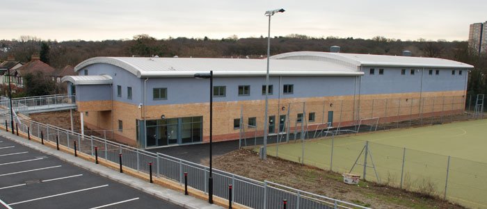 Large amenity building with car park